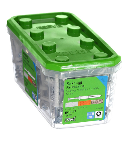 Transparent plastförpackning med grönt lock, etikett märkt "Spikplugg" och produktinformation i blått, grönt och vitt.